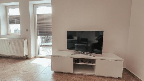 TV a/nebo společenská místnost v ubytování Amalie's FeWo