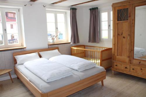 Ein Bett oder Betten in einem Zimmer der Unterkunft Jelängerjelieber