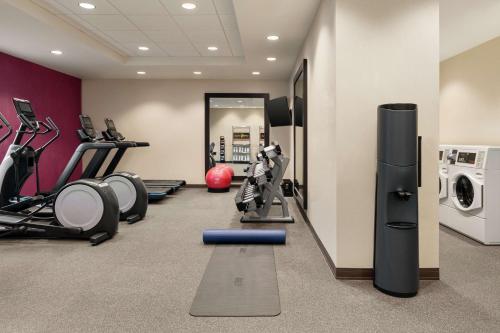a gym with treadmills and machines in a room at Home2 Suites By Hilton Glen Mills Chadds Ford in Glen Mills