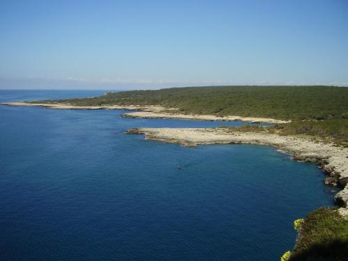 an island in the middle of a body of water at B&B a Casa della Nonna Uccia in Nardò