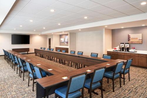 a large conference room with a long table and chairs at Hampton Inn Clewiston in Clewiston