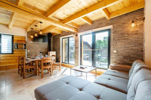 Posedenie v ubytovaní Agréable Chalet 3 étoiles App 3