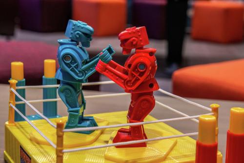 two toy robots are fighting in a toy fence at Tru By Hilton Elkhart, In in Elkhart