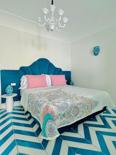 Una cama o camas en una habitación de Villa Dei Principi