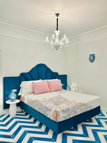 Una cama o camas en una habitación de Villa Dei Principi