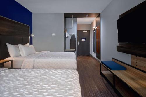 Ένα ή περισσότερα κρεβάτια σε δωμάτιο στο Tru By Hilton West Memphis, Ar