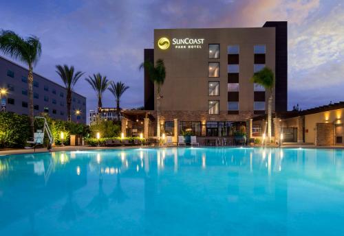 a large swimming pool in front of a hotel at SunCoast Hotel Anaheim, Tapestry Collection by Hilton in Anaheim