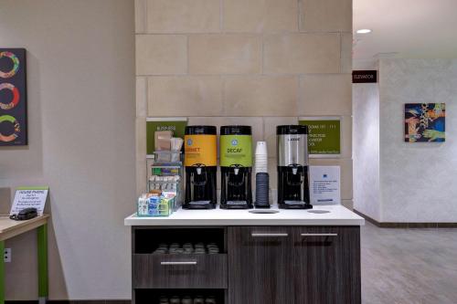 a counter in a room with aasteryasteryasteryasteryasteryasteryasteryasteryastery at Home2 Suites By Hilton Lewisville Dallas in Lewisville