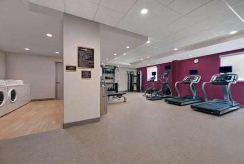 a gym with treadmills and exercise equipment in a building at Home2 Suites By Hilton Tracy, Ca in Tracy