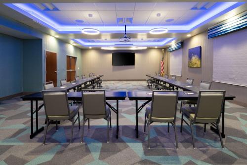 a conference room with a long table and chairs at Hampton Inn & Suites Gilroy, Ca in Gilroy