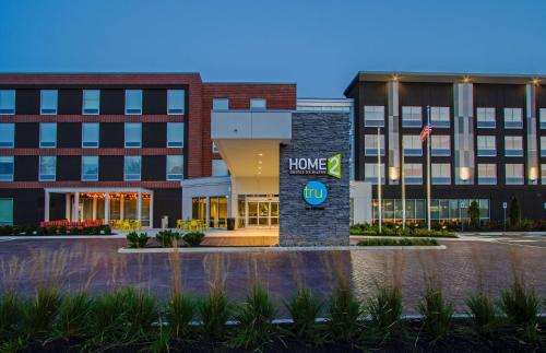 a front view of a building with a home at Tru By Hilton Grove City Columbus in Grove City