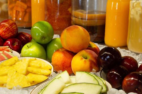 a bunch of fruits and vegetables on a table at Atocha Hotel Madrid, Tapestry Collection by Hilton in Madrid