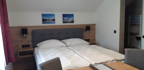 Postel nebo postele na pokoji v ubytování Haus Beutle