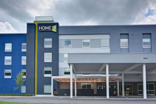 a large blue building with a home depot sign on it at Home2 Suites By Hilton Fort Mill, Sc in Fort Mill
