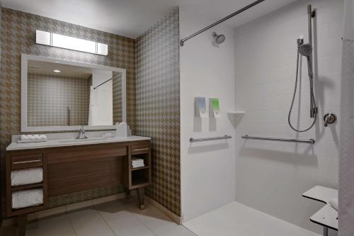 a bathroom with a sink and a shower at Home2 Suites By Hilton Fort Mill, Sc in Fort Mill