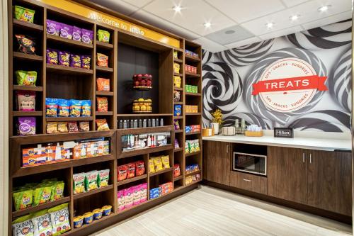 a food section of a grocery store with aries sign on the wall at Hampton Inn & Suites Indio, Ca in Indio