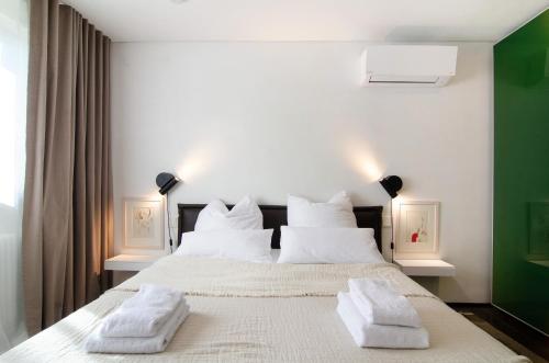 Ένα ή περισσότερα κρεβάτια σε δωμάτιο στο Domicile Relax