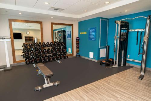 a gym with a lot of equipment in a room at Hampton Inn & Suites Imperial Beach San Diego, Ca in Imperial Beach