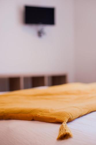 Ένα ή περισσότερα κρεβάτια σε δωμάτιο στο **Auberge de l'Aude**