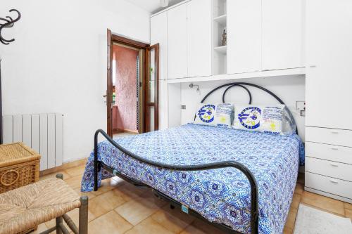 Postel nebo postele na pokoji v ubytování Villetta Meyer Lu Pitrali