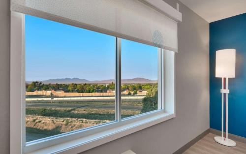 a window in a room with a view of a tennis court at Tru By Hilton Clearfield Hill Air Force Base, Ut in Clearfield
