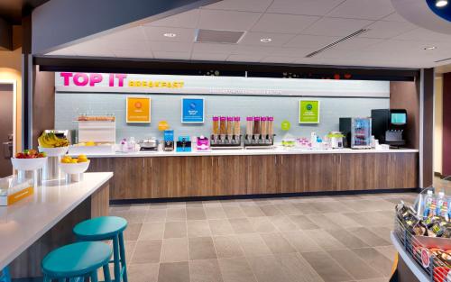 a top it rewards counter in a store at Tru By Hilton Clearfield Hill Air Force Base, Ut in Clearfield