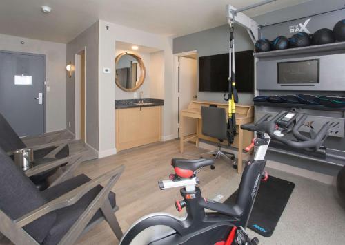 a room with a gym with a bike in it at Doubletree By Hilton Chico, Ca in Chico