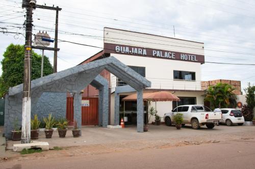a building with a sign that reads guiluana palace motel at Guajará Palace Hotel in Porto Velho