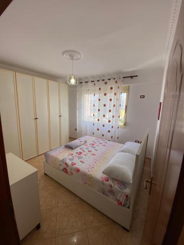 Apartament 1+1 tesisinde bir odada yatak veya yataklar
