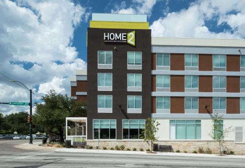 an office building with a home depot sign on it at Home2 Suites by Hilton Fort Worth Cultural District in Fort Worth