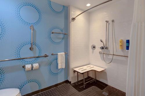 a bathroom with a shower and a toilet at Tru By Hilton Grantville, Pa in Grantville