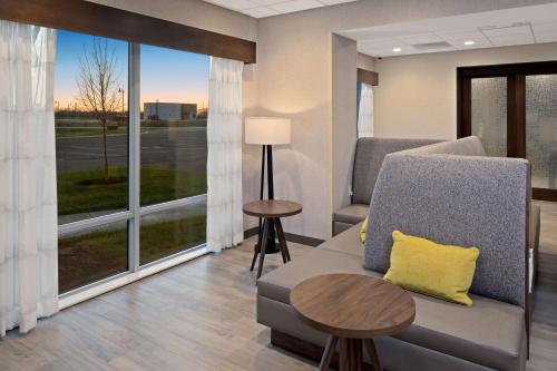 a living room with a couch and a table at Hampton Inn Circleville, Oh in Circleville