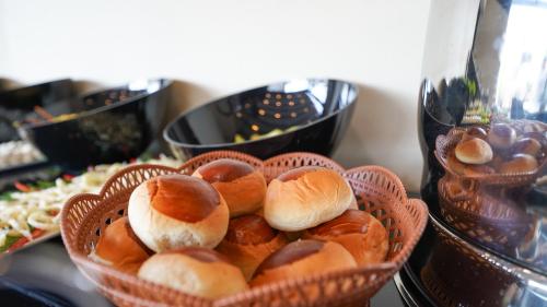 a bowl of buns and other food on a table at Bellezza Hotel in Istanbul