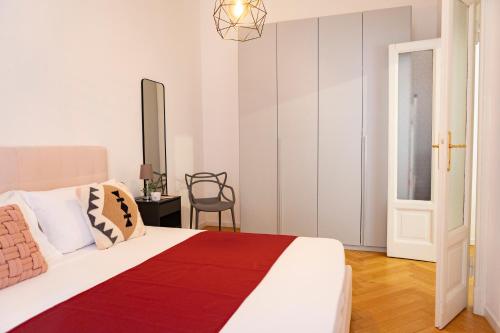 A bed or beds in a room at Macchi delicious Apartment