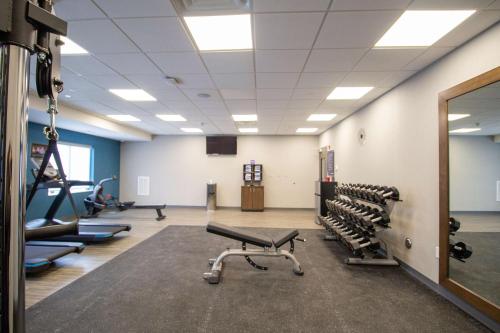 a gym with treadmills and machines in a room at Hampton Inn North Attleboro, Ma in North Attleboro