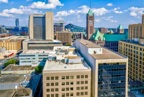 a view of a city skyline with a clock tower at Home2 Suites by Hilton Minneapolis Downtown in Minneapolis