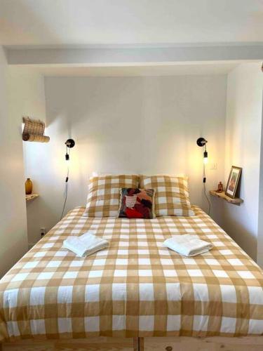 Ein Bett oder Betten in einem Zimmer der Unterkunft Villa Martha - Appt 01