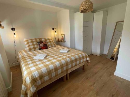 Ein Bett oder Betten in einem Zimmer der Unterkunft Villa Martha - Appt 01