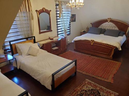 Ένα ή περισσότερα κρεβάτια σε δωμάτιο στο Amazing 8BR Suites Waterview House & SPA