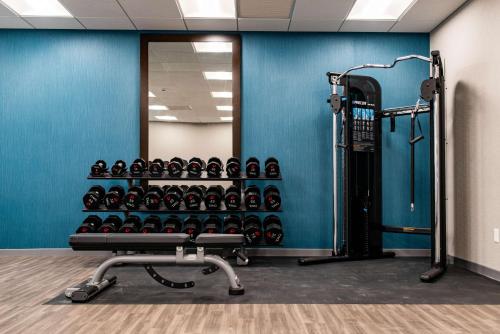 a gym with a rack of wine bottles at Hampton Inn Paris IL, IL in Paris