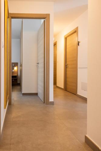 Postel nebo postele na pokoji v ubytování Hôtel Le Bastia