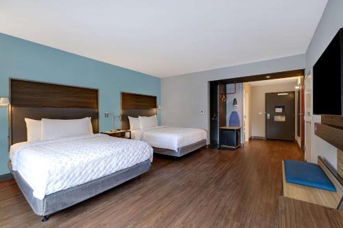 Ein Bett oder Betten in einem Zimmer der Unterkunft Tru by Hilton Lithia Springs, GA