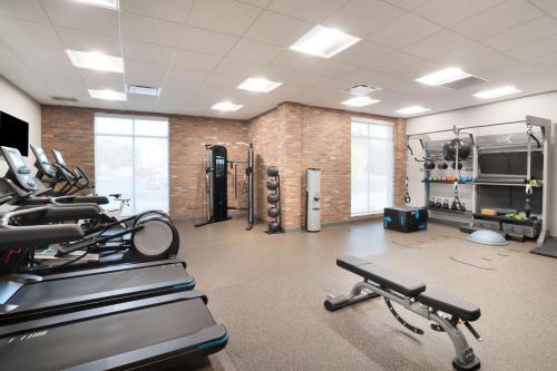 a gym with a bunch of treadmills and machines at Hampton Inn Greer Greenville, Sc in Greer
