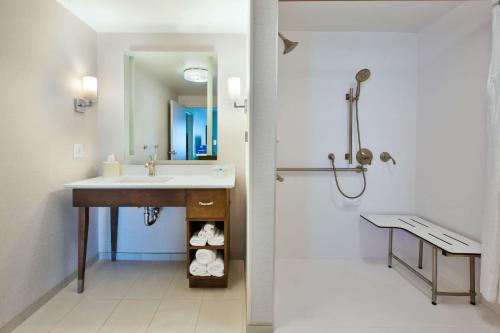 a bathroom with a sink and a shower at Homewood Suites By Hilton Columbus Easton, Oh in Columbus