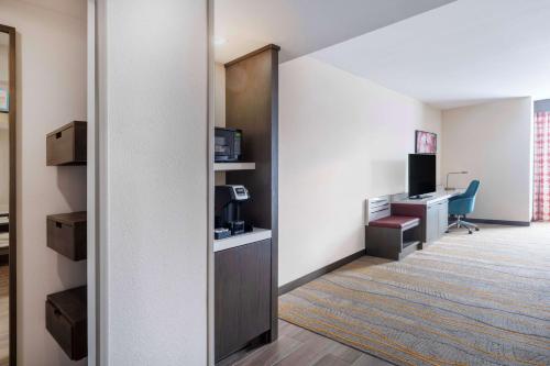an office with a door leading into a room at Hilton Garden Inn Chino Hills Pomona CA in Pomona