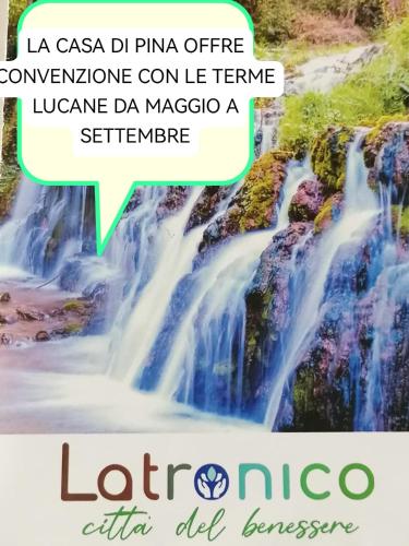 a picture of a waterfall with a text overlay at La casa di Pina in Latronico