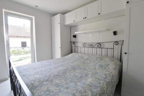 Postel nebo postele na pokoji v ubytování Holiday house Andreja