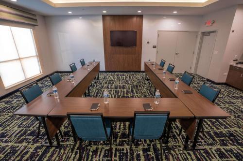 a large conference room with a long table and chairs at Hampton Inn By Hilton Huntley Chicago in Huntley