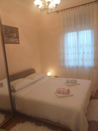 Posteľ alebo postele v izbe v ubytovaní Mari
