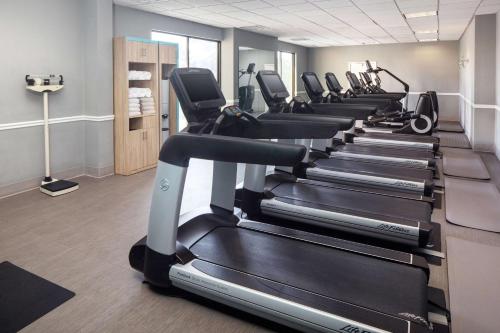 a row of tread machines in a gym at DoubleTree by Hilton Cherry Hill Philadelphia in Cherry Hill